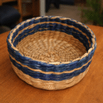 Handwoven Natural Fiber Basket with Blue Accent